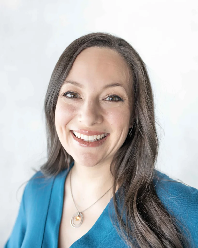 clean headshot of a woman smiling