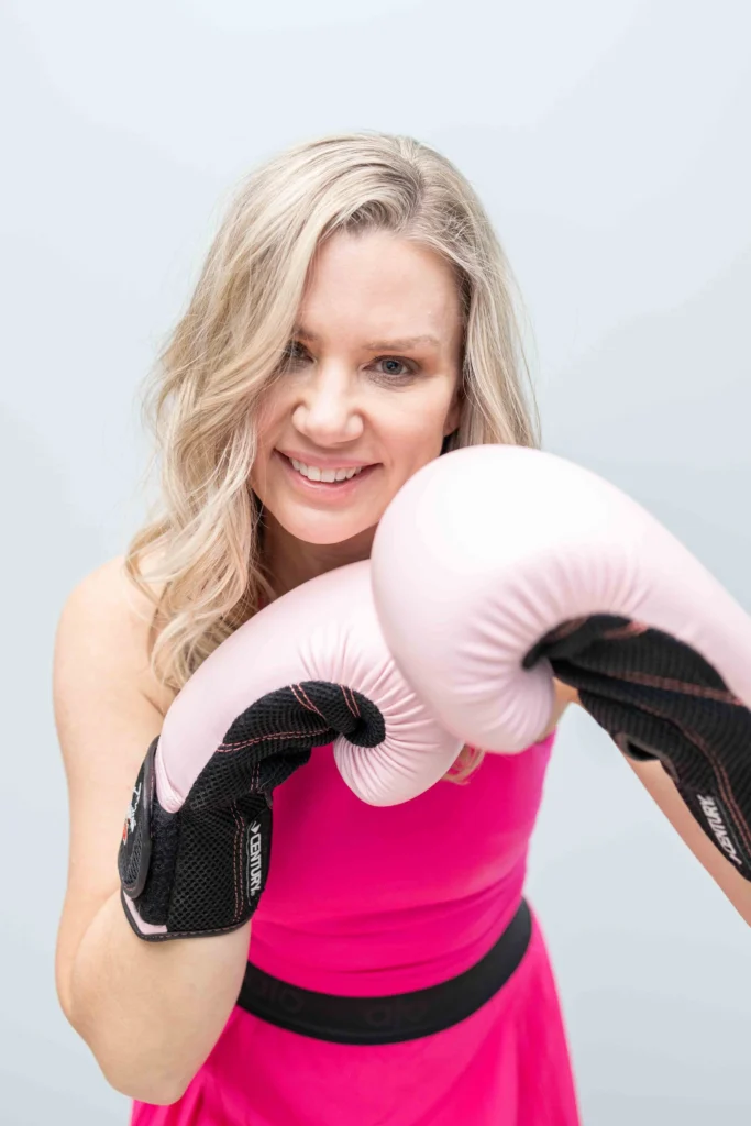 woman wearing boxing gloves