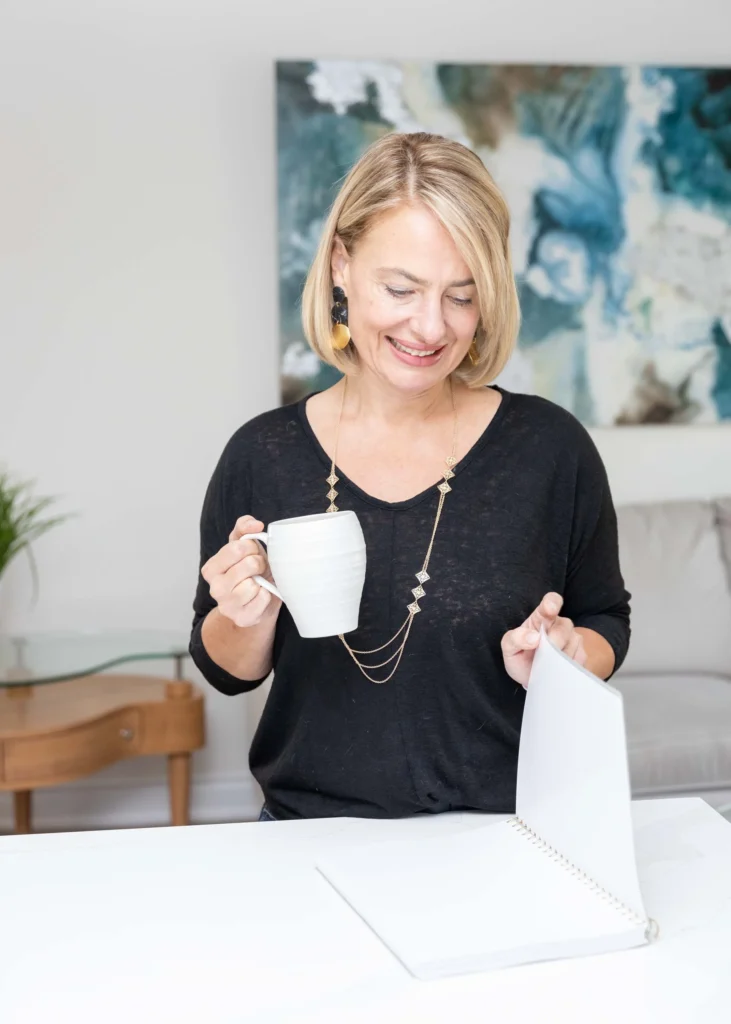creative business woman holding a cup