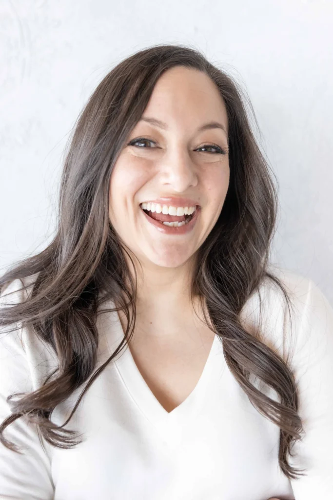 headshot of a smiling woman