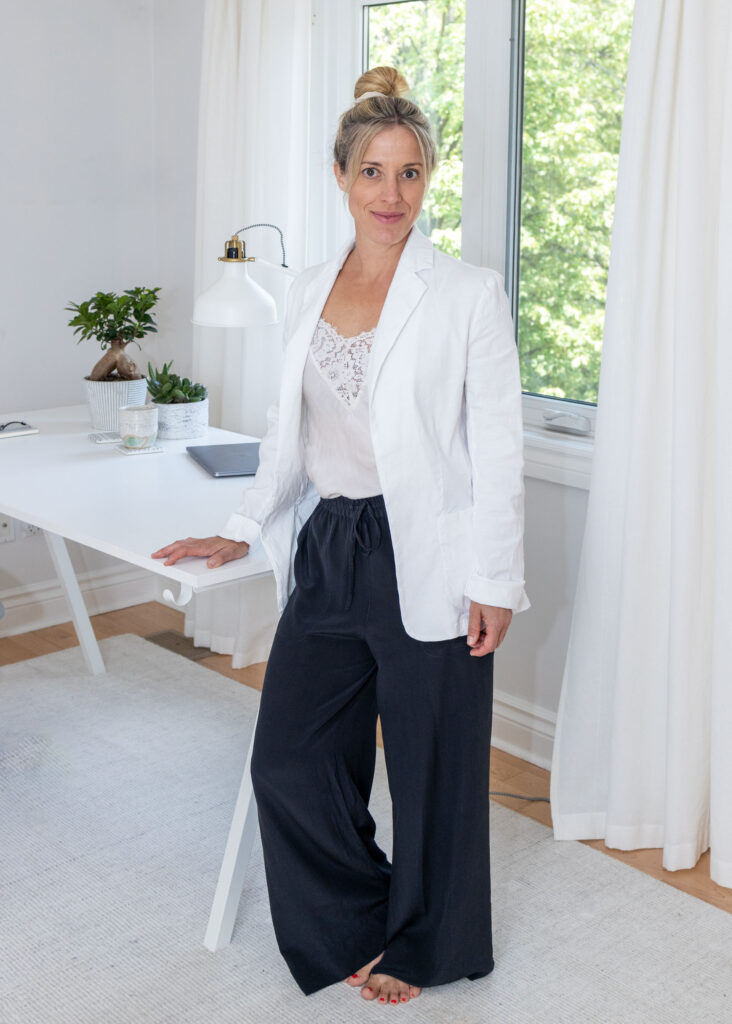 professional woman standing by desk