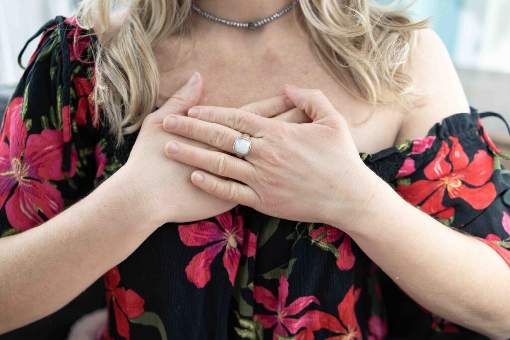 woman crossing hands across her chest - branding photo by Marta Raptis