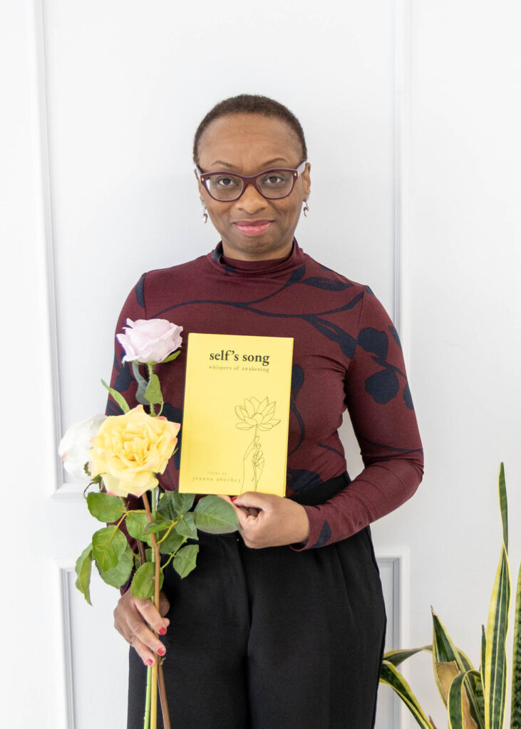 author branding photography holding a book Burlington