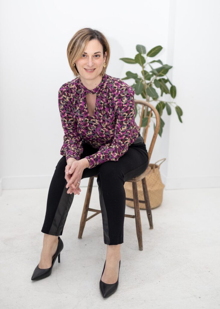 woman sitting on stool