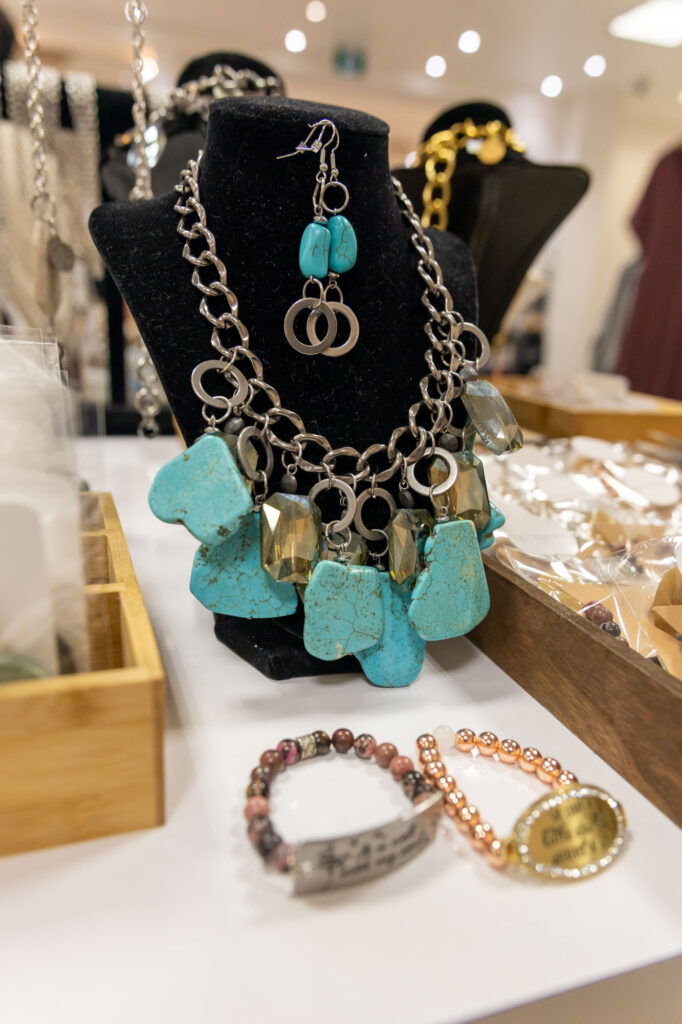 Jewelry product photography featuring turquoise necklaces and accessories displayed in a Mississauga boutique.